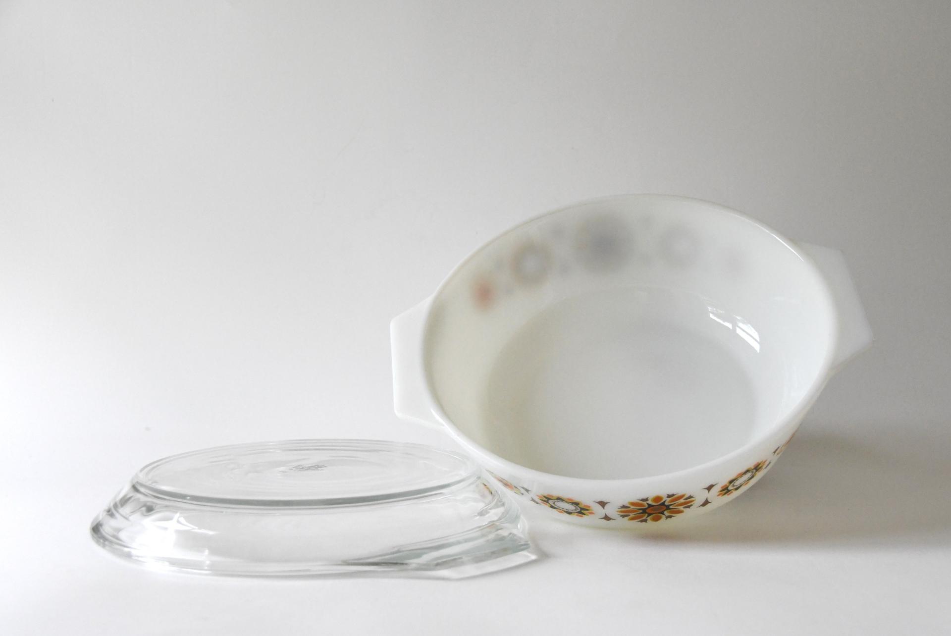 JAJ Pyrex. TOLEDO Bowl with orange and black flowers. Lid and dish. Pyrex Glass Stovetop. 1969s Collectible