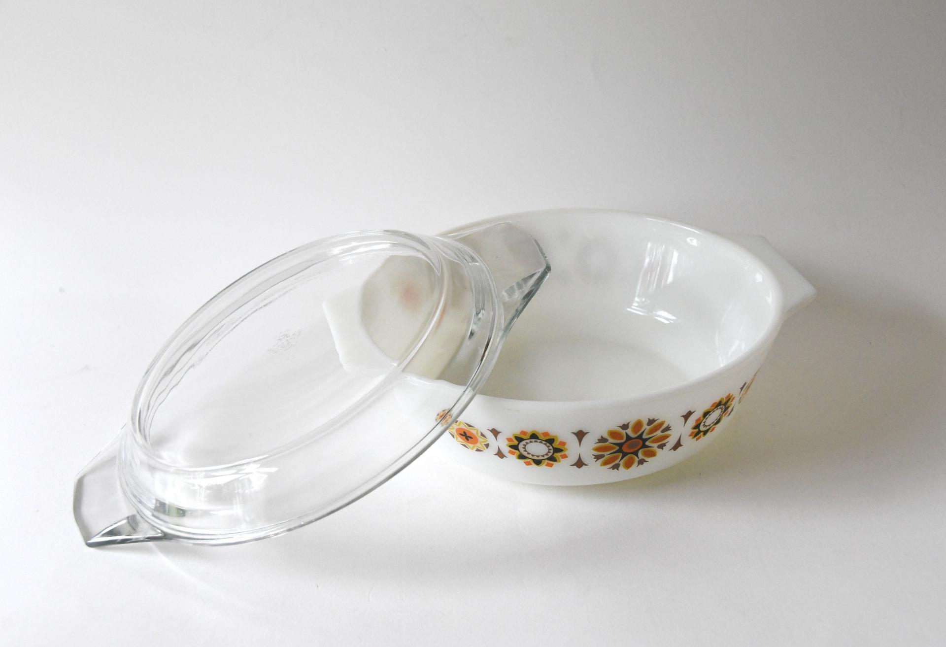 JAJ Pyrex. TOLEDO Bowl with orange and black flowers. Lid and dish. Pyrex Glass Stovetop. 1969s Collectible