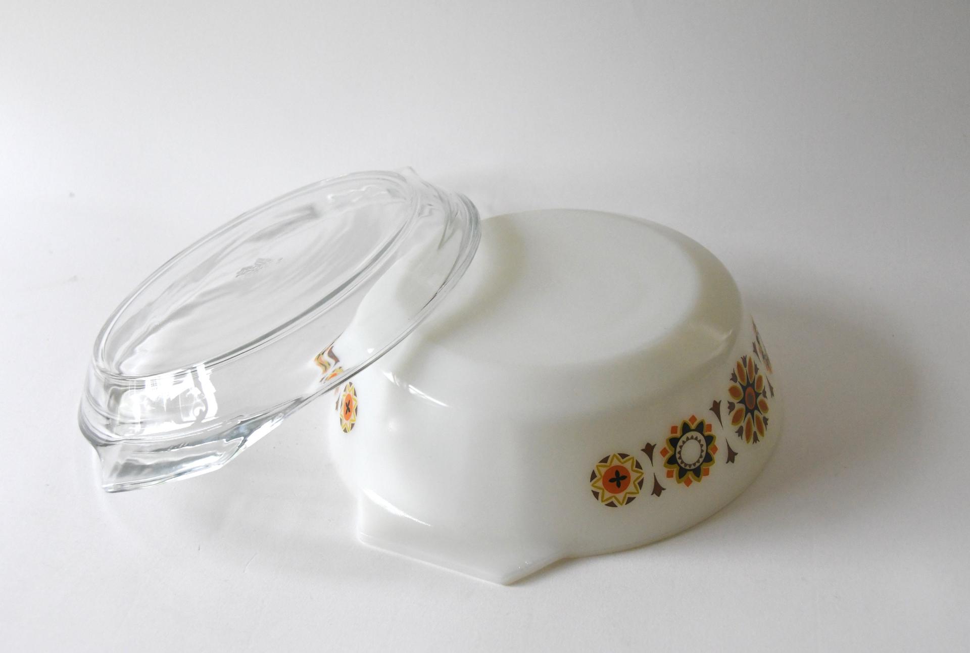 JAJ Pyrex. TOLEDO Bowl with orange and black flowers. Lid and dish. Pyrex Glass Stovetop. 1969s Collectible